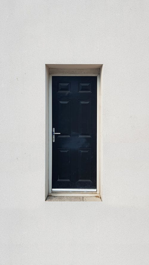 Free Door in Building Wall Stock Photo