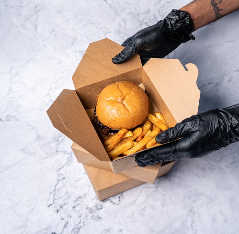 Free Photo of Burger and Fries in a Takeout Box Stock Photo