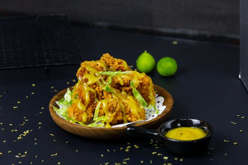 Cooked Food on Brown Wooden Plate