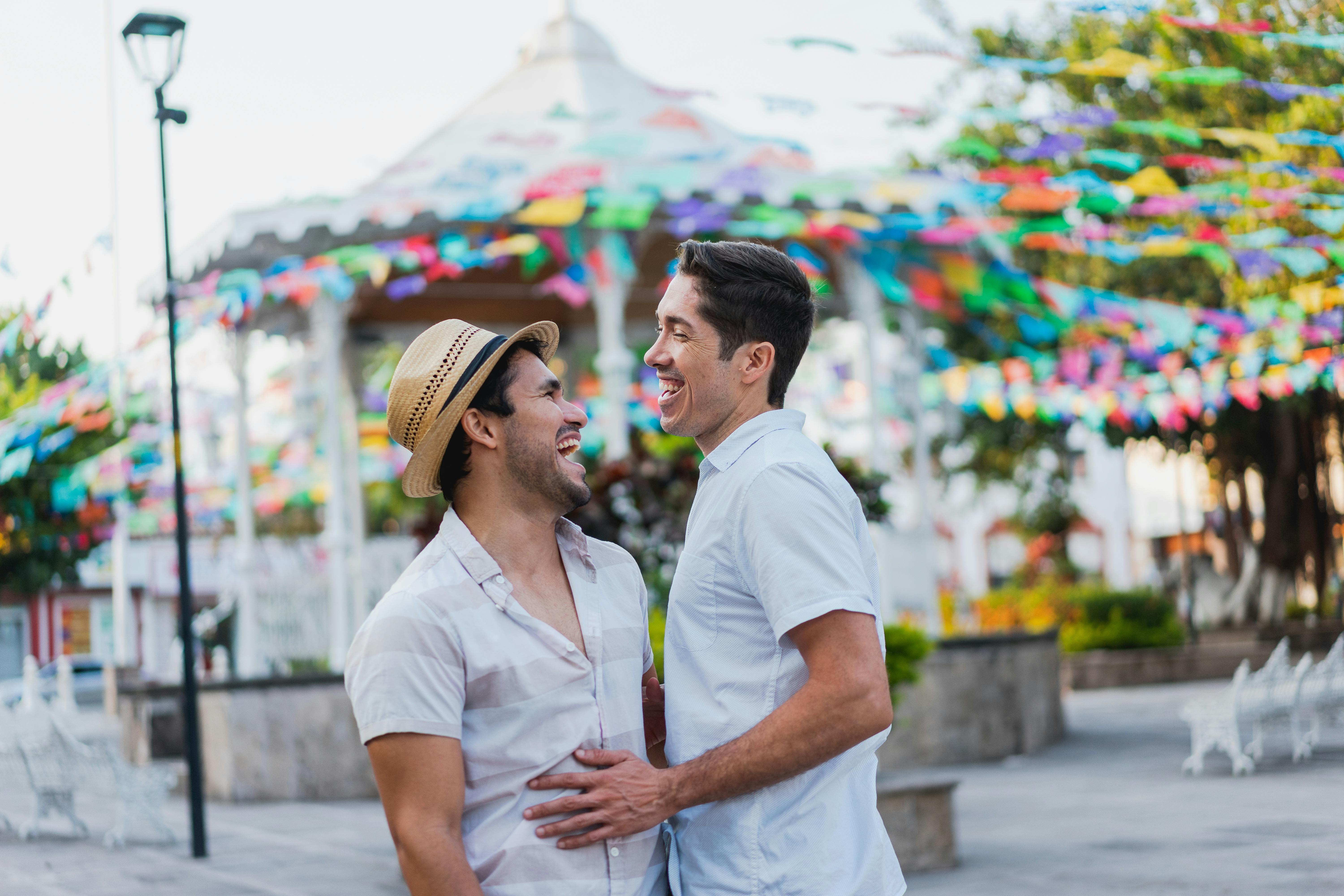 a couple in the street laughing together