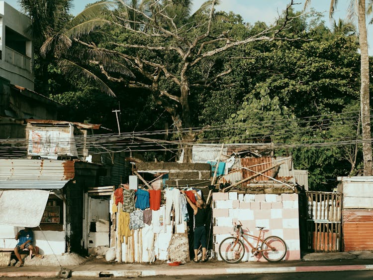 A Man Hanging Clothes