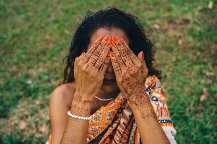 A Woman With Henna On Her Hands 