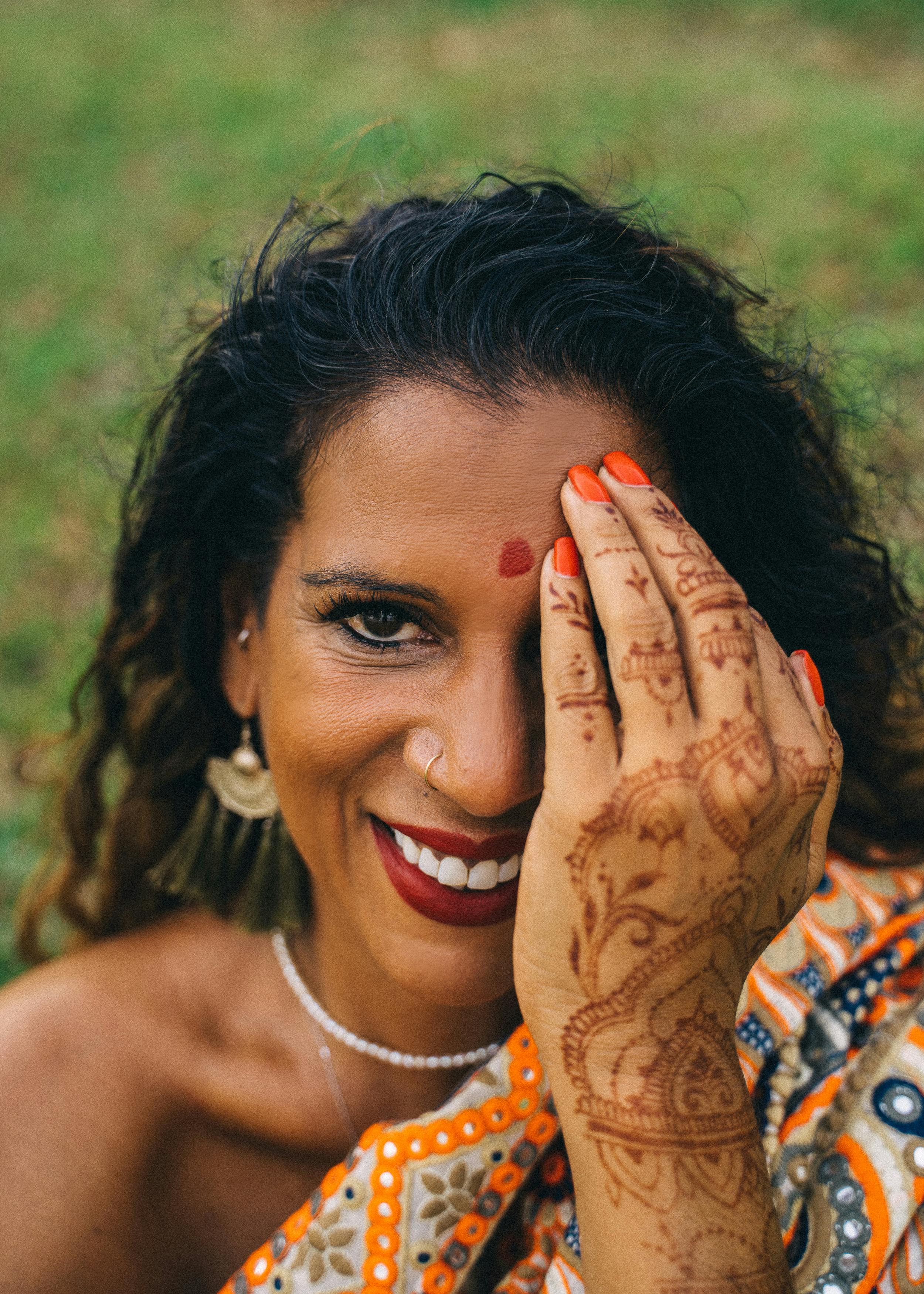 Woman in White Tank Top Smiling