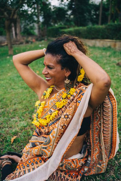 Happy woman in traditional saree
