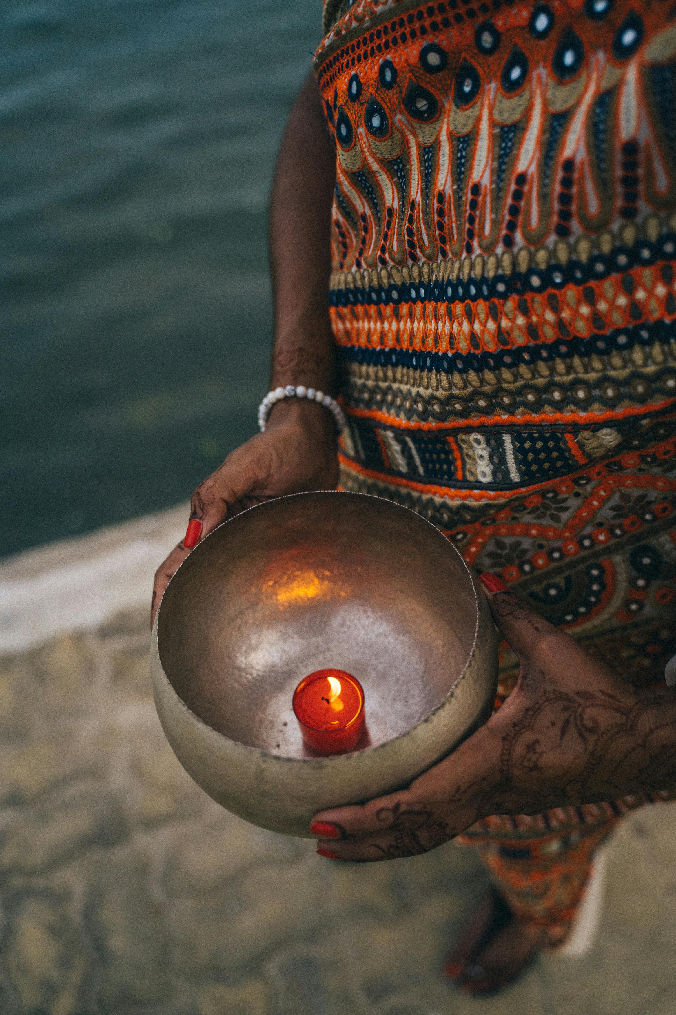 Person Holding Gold Ball