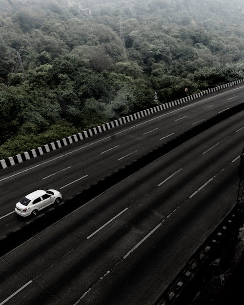 A White Car on the Road