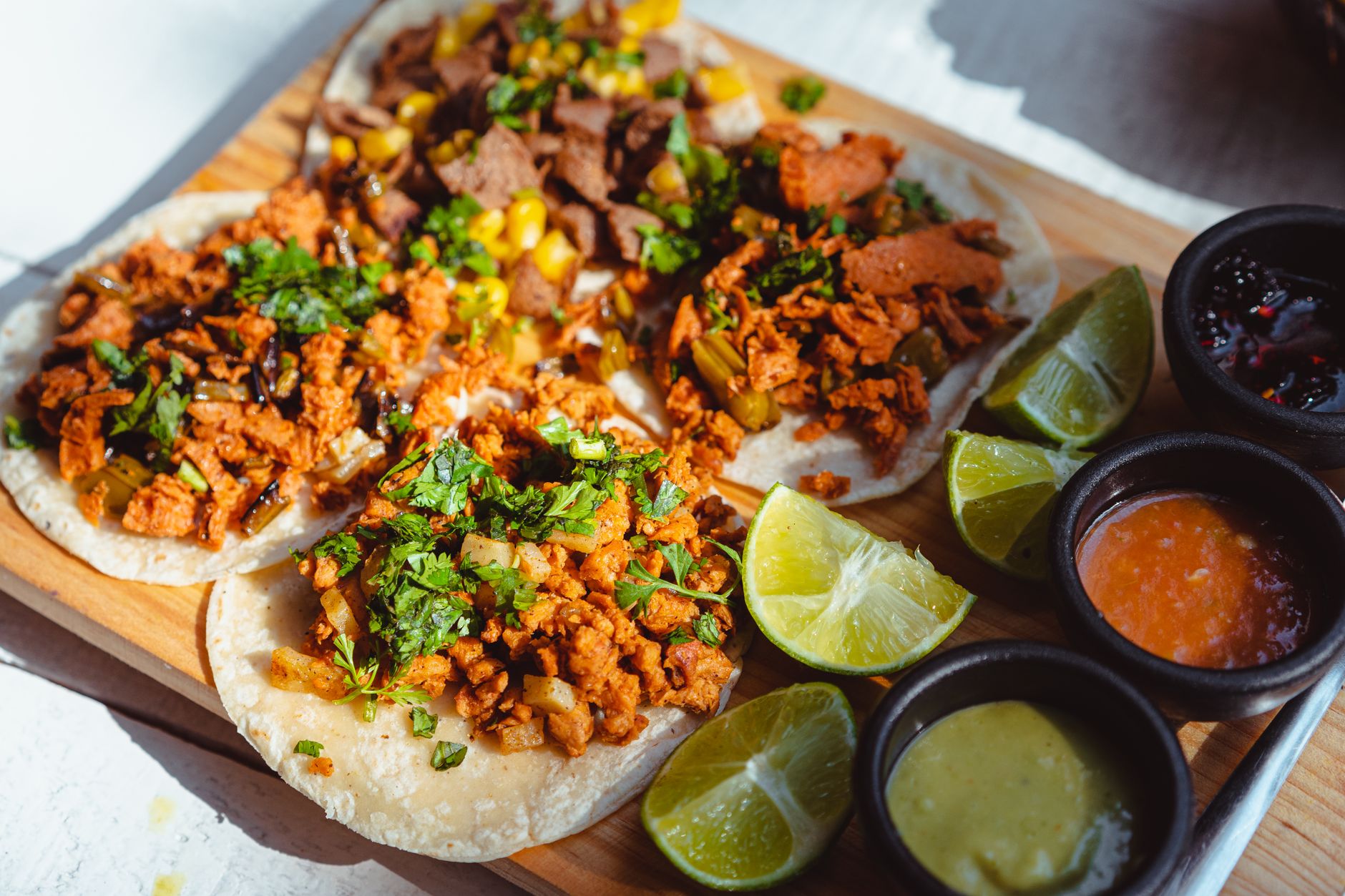 Close-up of Tacos on a Wooden Chopping Board