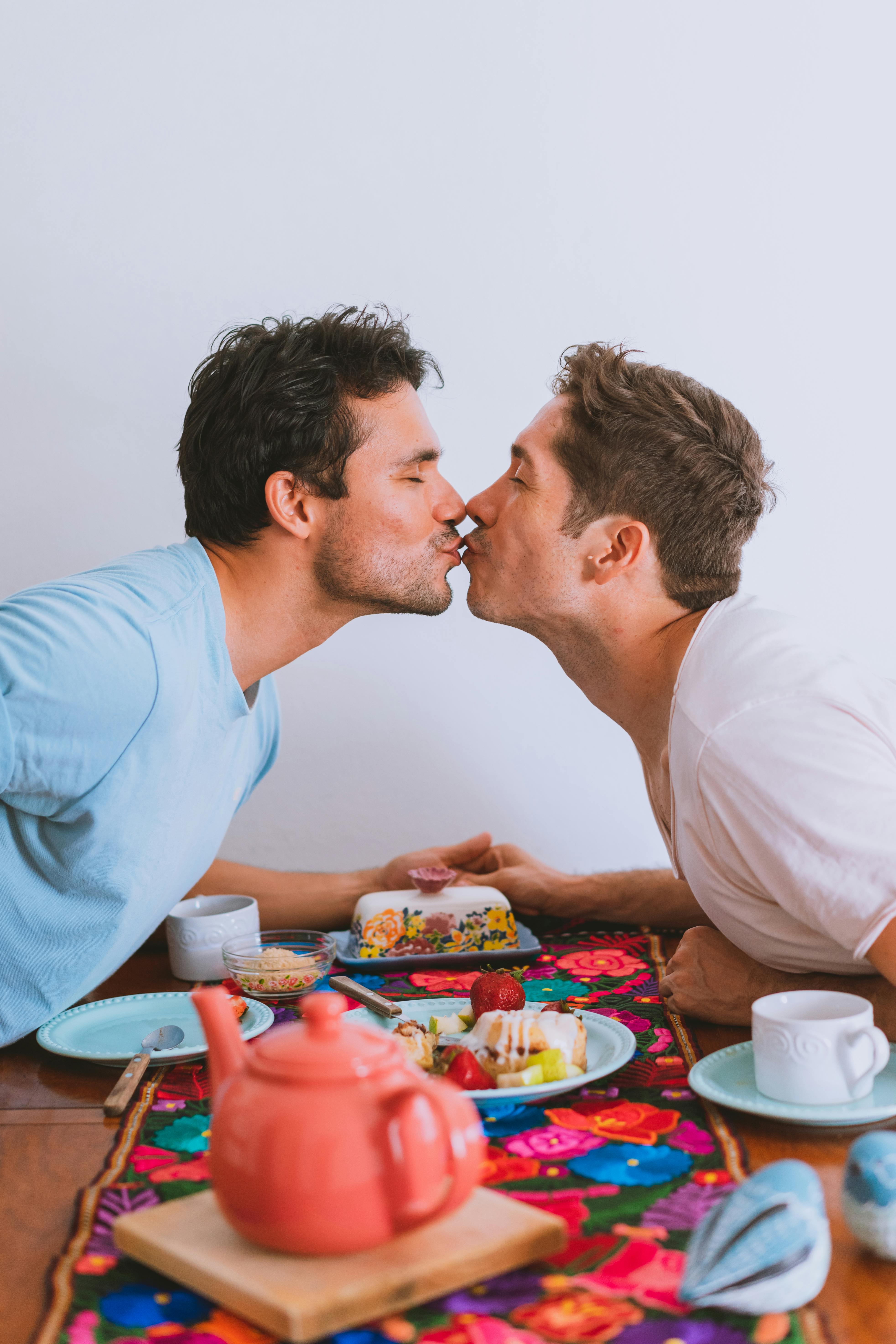 photo of men kissing
