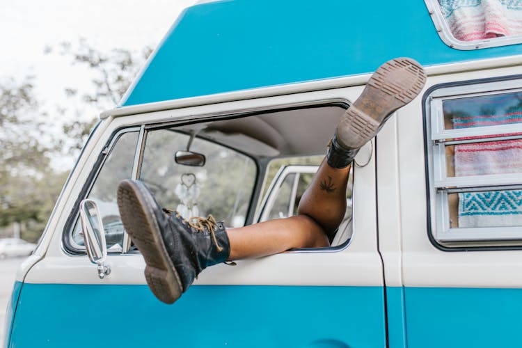 A Person Feet Out Of The Car Window