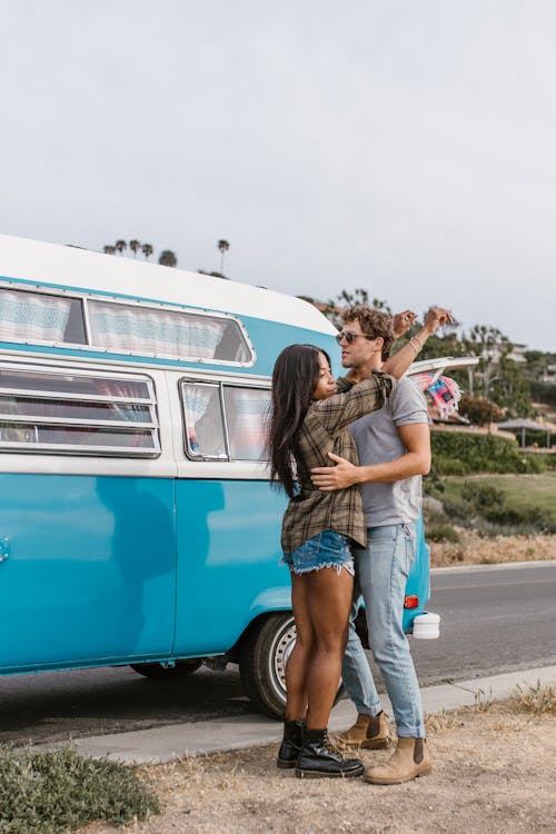 A Couple Dancing Outside the Van