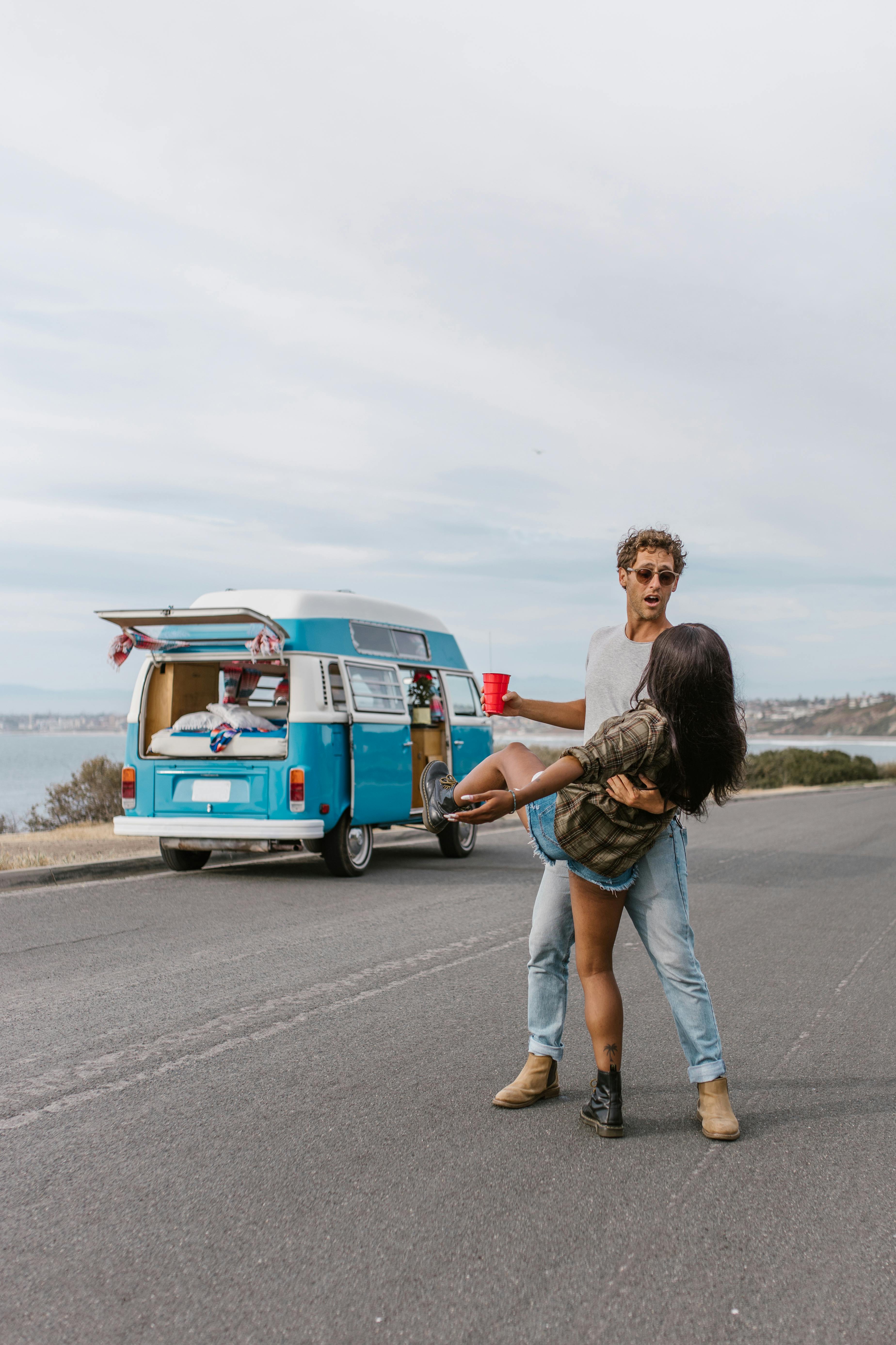 a couple dancing on the road