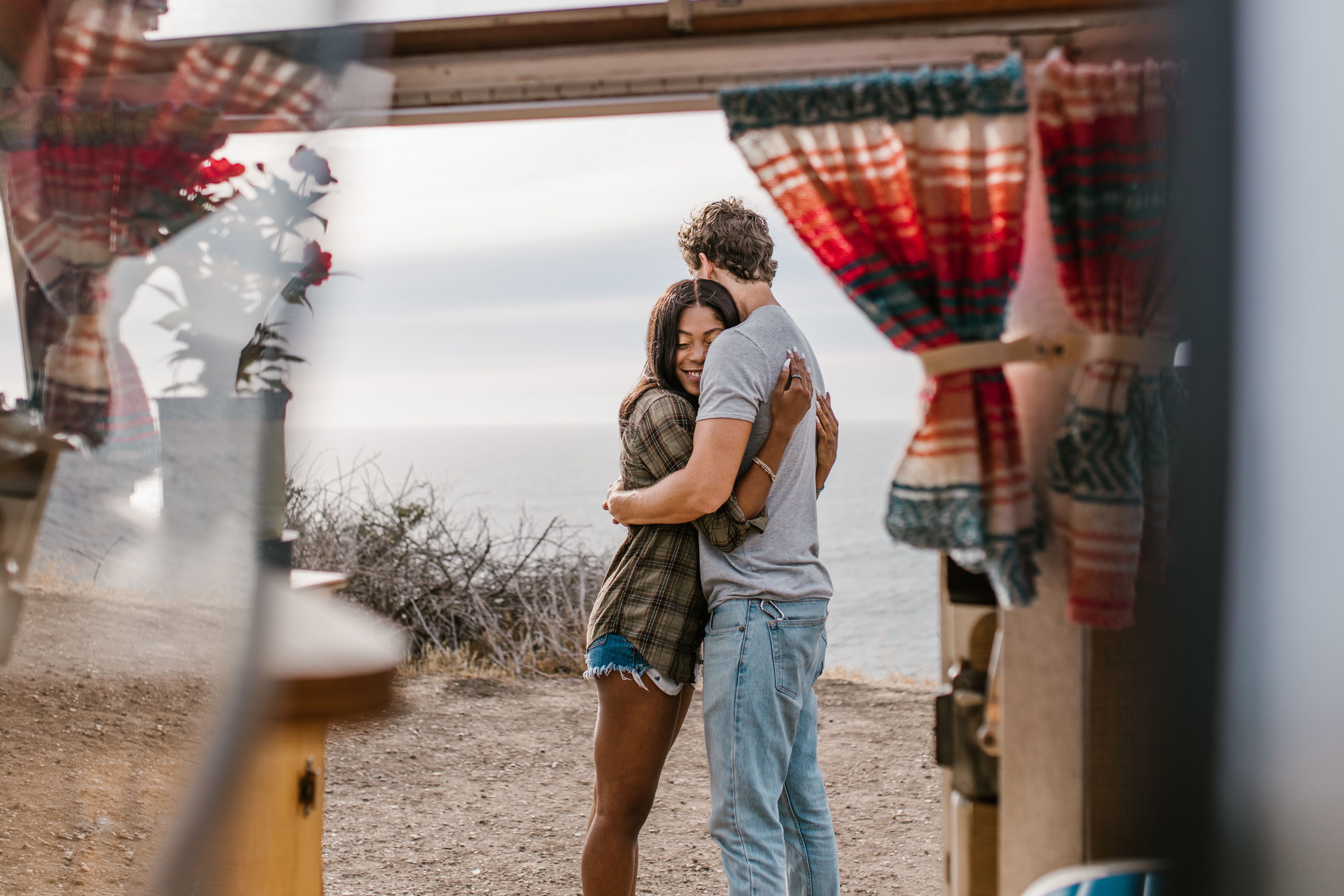 Photo of a woman hugging man from behind him · Free Stock Photo