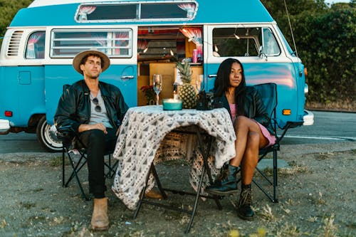 A Couple Sitting at the Table