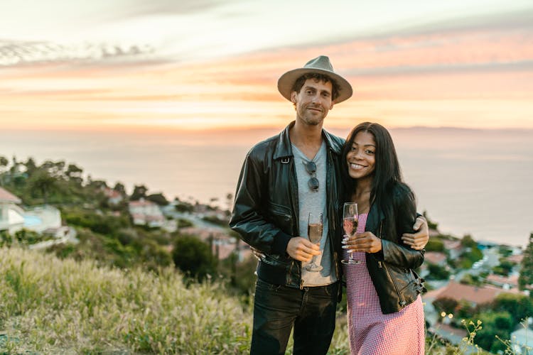 A Couple Drinking Wine Outdoors