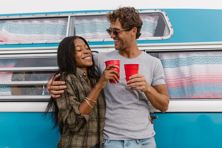 Couple Holding Red Cups