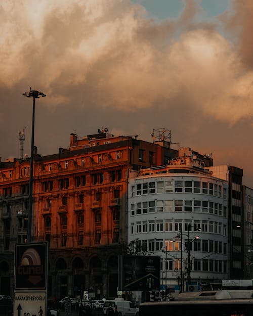 Concrete Building Under Cloudy Sky