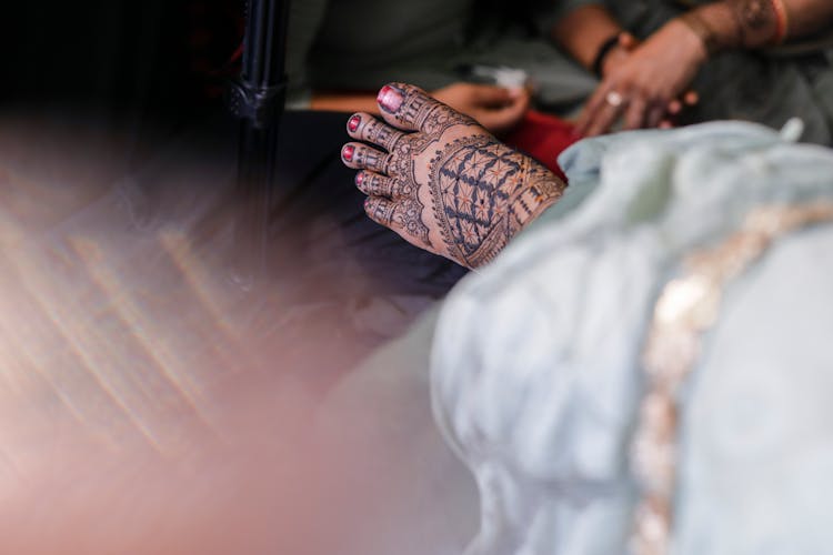 Female Feet With Traditional Mehndi Painting