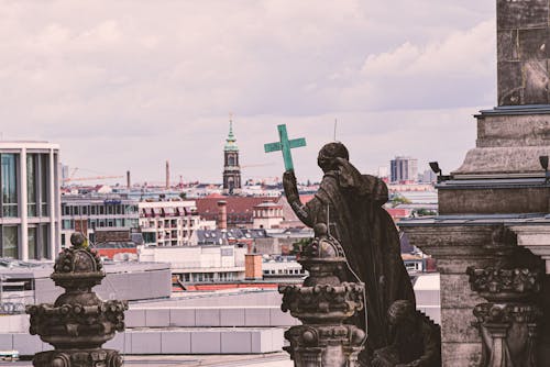 Over Looking a City from the Weathered Structure with Sculptures 