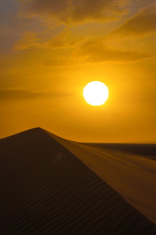 Silhouette of Sand during Sunset