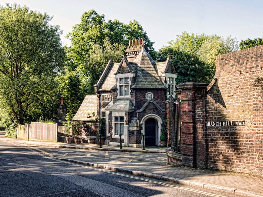 A picturesque historic brick house in Branch Hill, Greater London, captured on a sunny day.