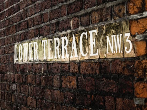 Lower Terrace Signage On Brick Wall