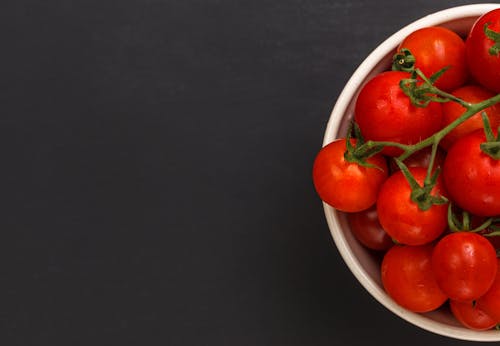 Red Tomatoes on White Ceramic Bowl