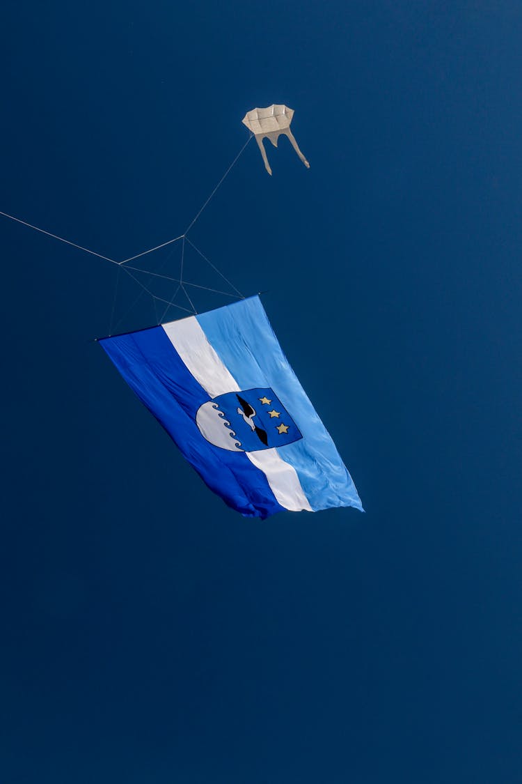 Flag Flying In Blue Sky