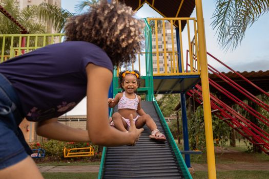 Mother and Daughter Enjoying the Play Ground