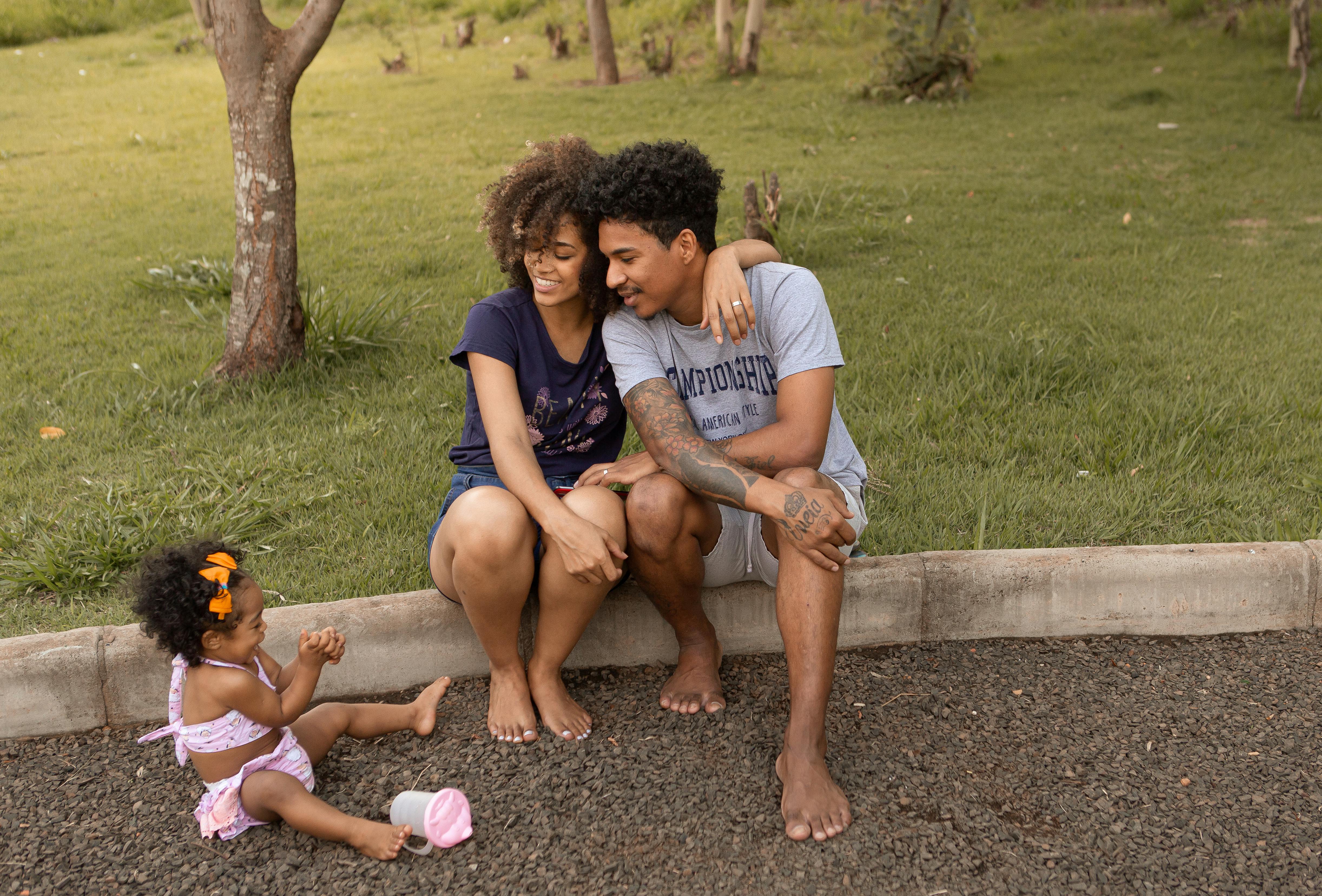 beautiful couple with their baby girl