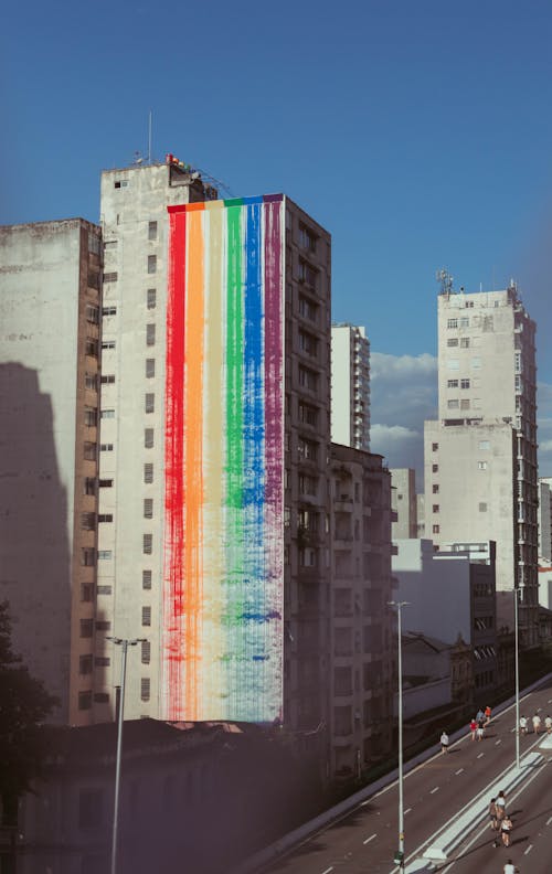Rainbow Flag Painted on an Apartment Building in City 