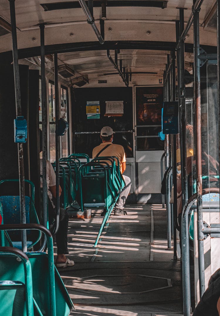 Back Of A Man Sitting In A Bus