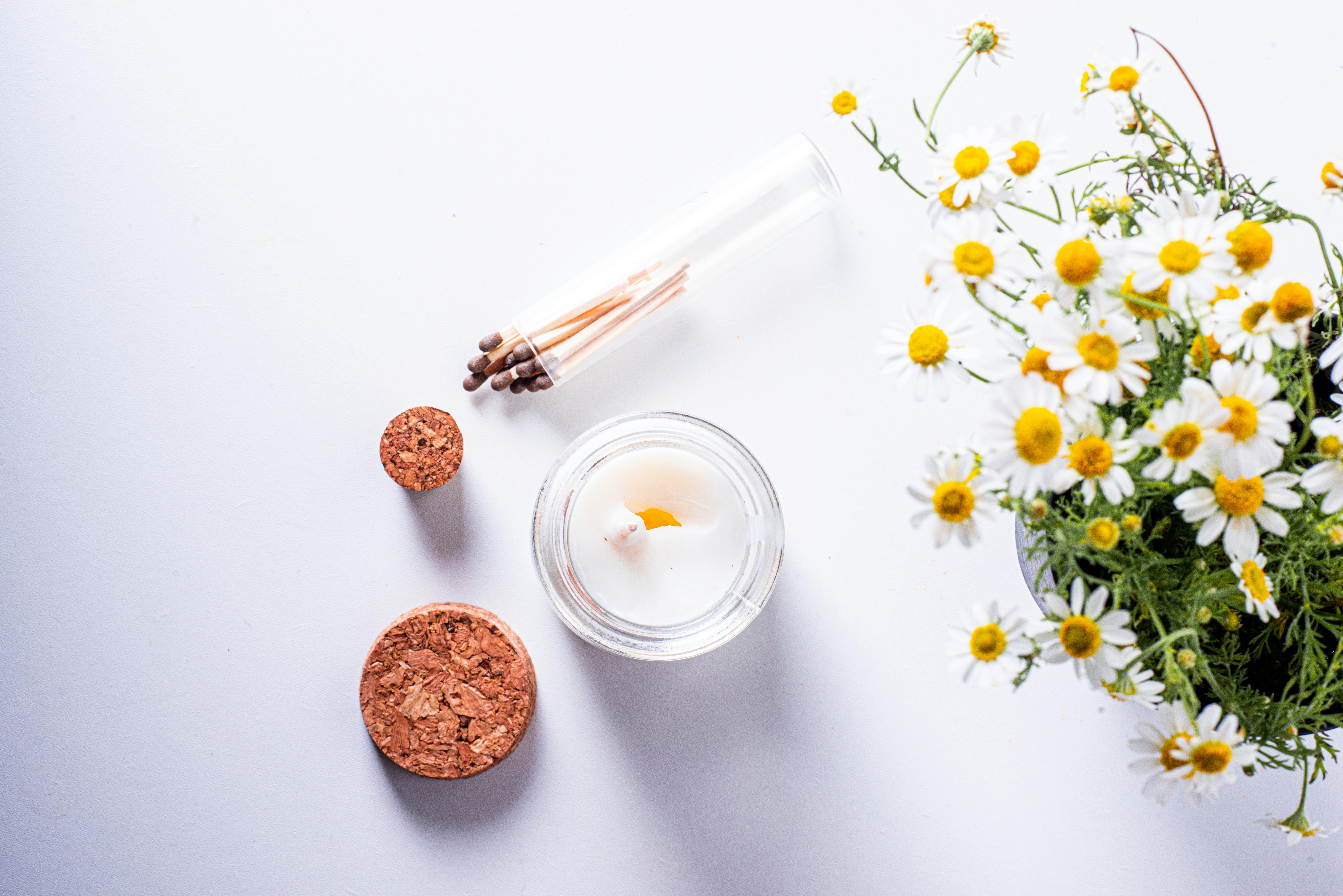 overhead shot of a candle and match