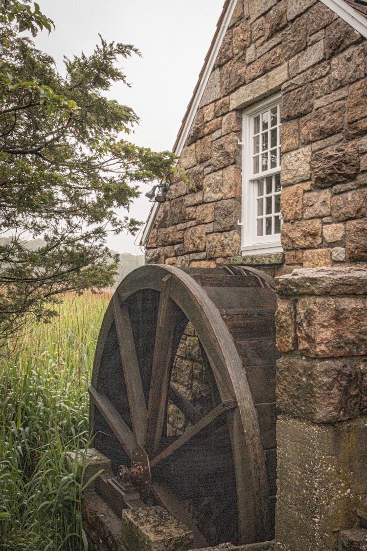 A Wooden Wheel Used In Irrigation