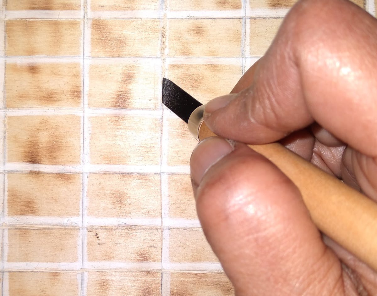 Professional plumber performing preventive drain maintenance and inspection in St. George Utah