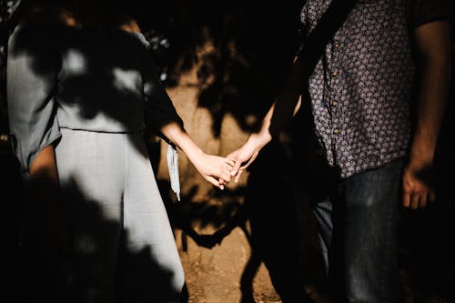 Two People holding Hands