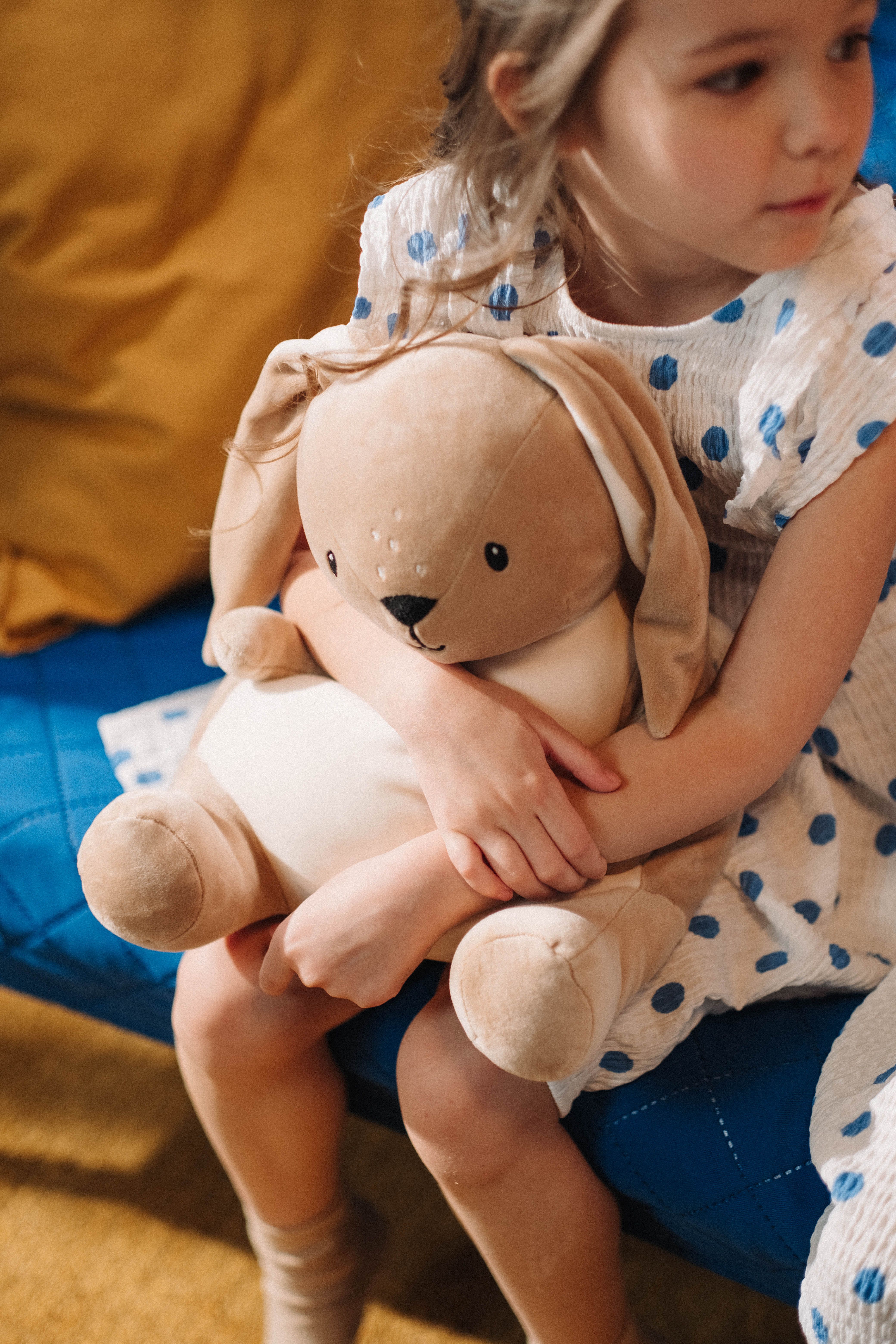 A Girl Embracing a Stuffed Toy · Free Stock Photo