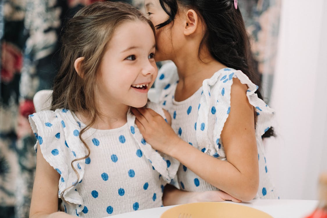 Free Young Girls Wearing Polka Dot Dresses Sxmiling Stock Photo