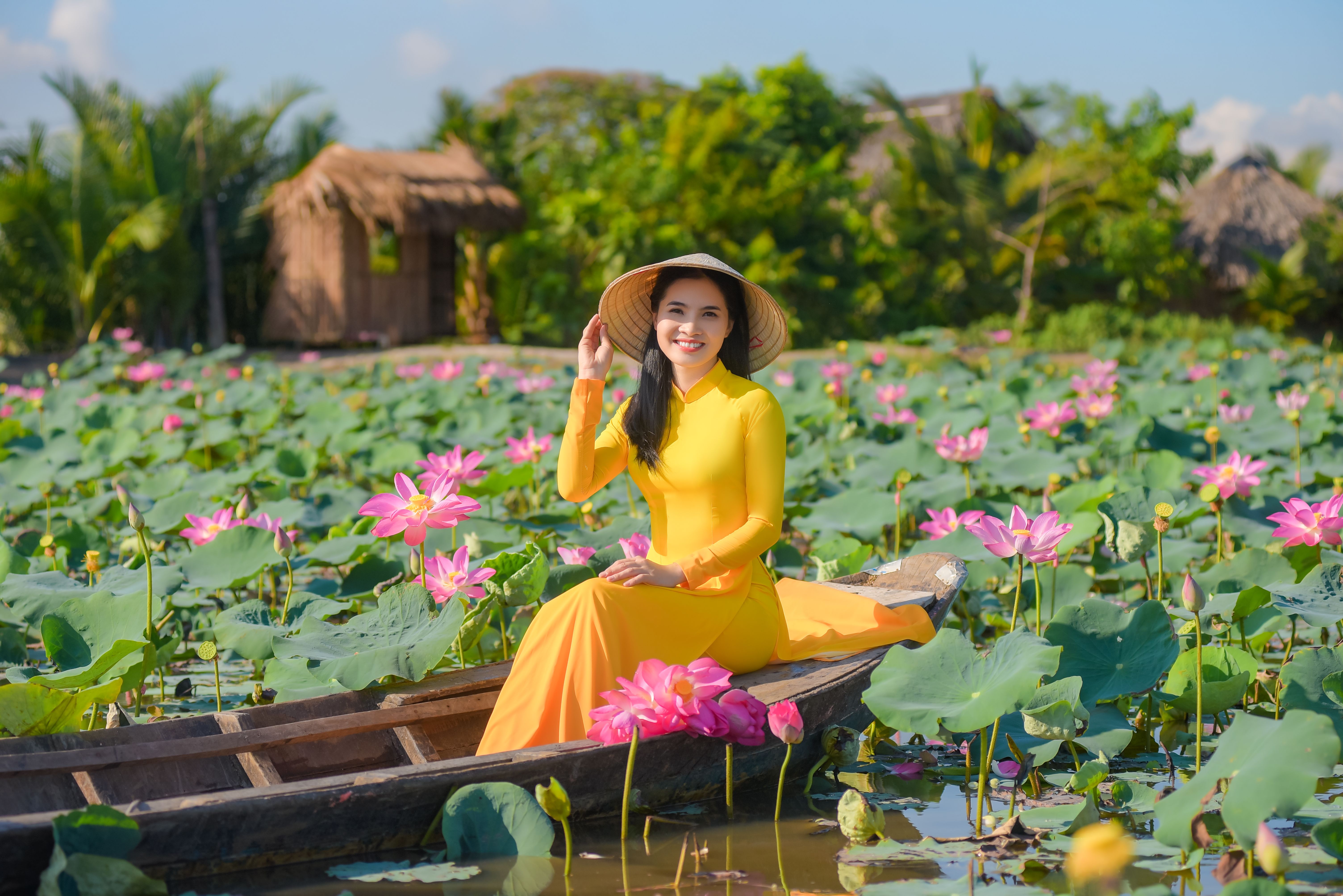 Woman in Yellow Dress sitting on a Boat · Free Stock Photo