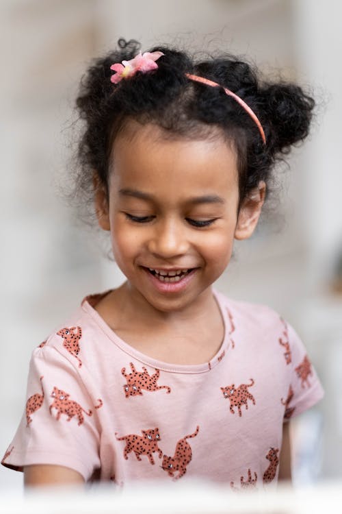 Young Girl with Headband while Smiling 