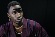 A Man with Black Butterfly on his Face