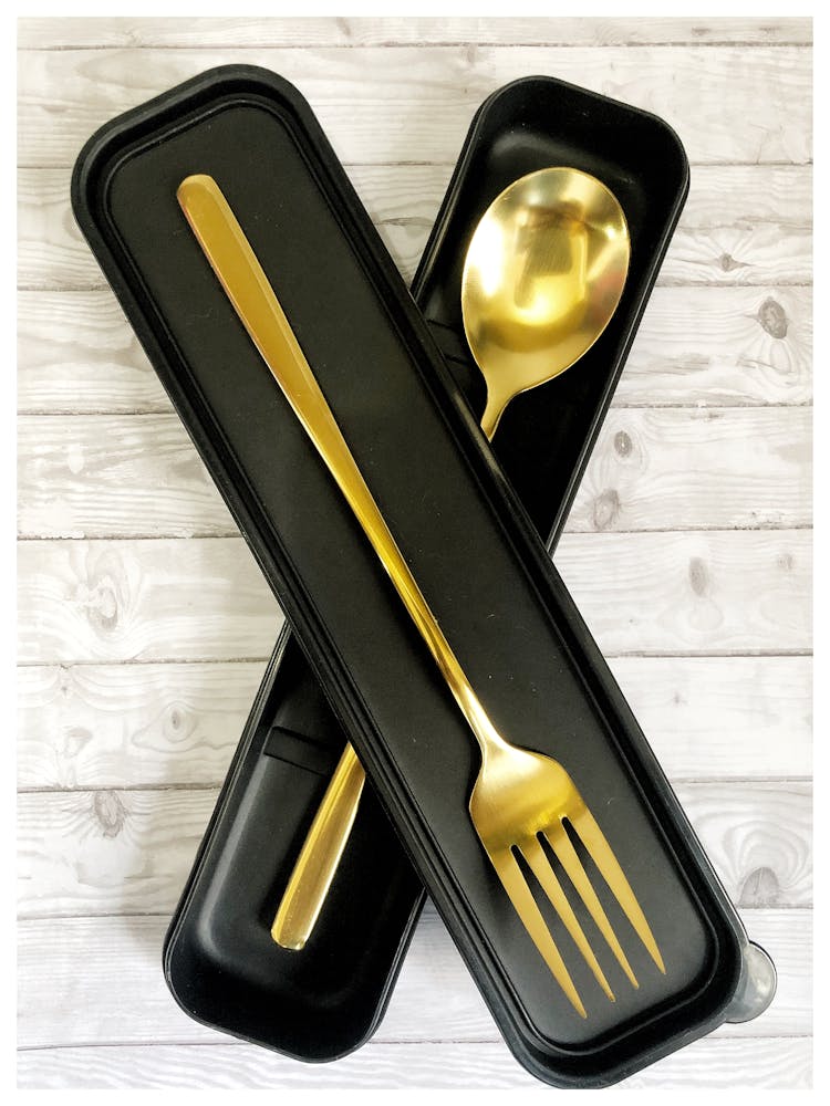 A Golden Spoon And Fork