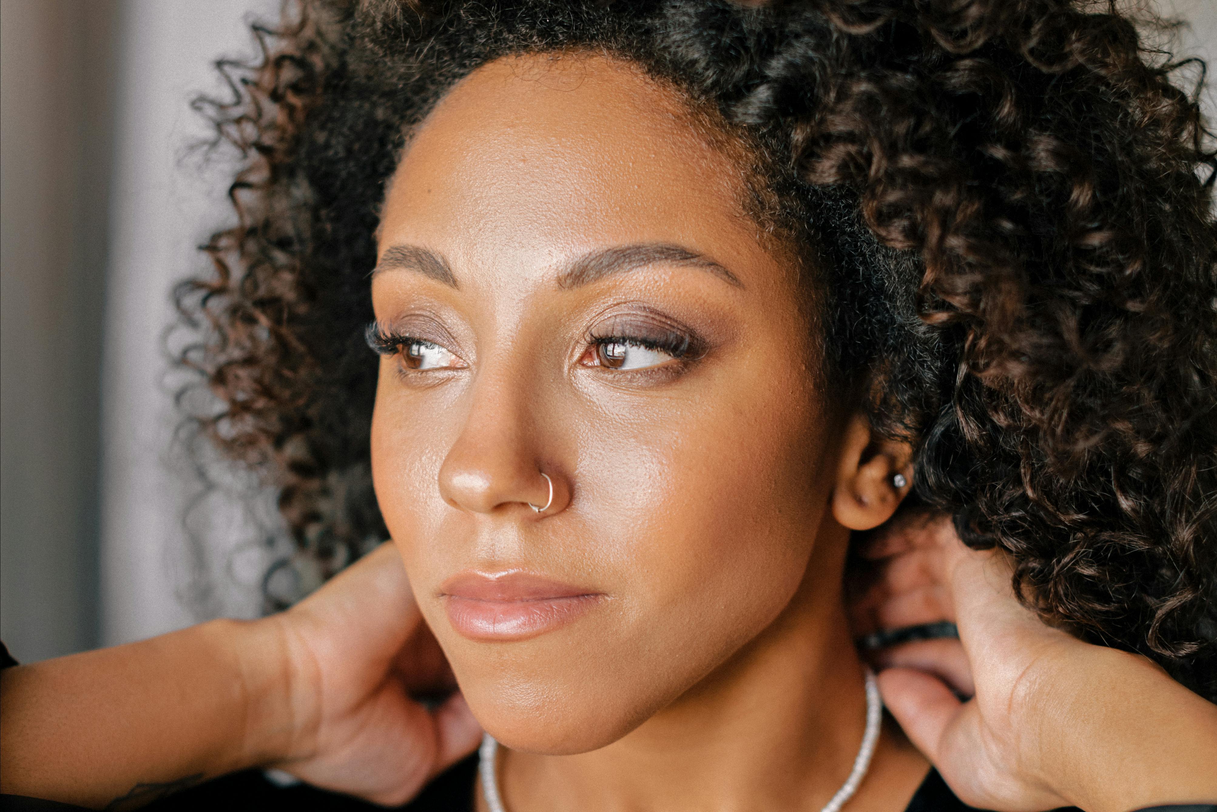 Close up of a face with dewy, glowing skin