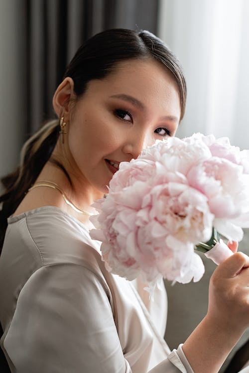 A Girl Holding Flower Bouquet