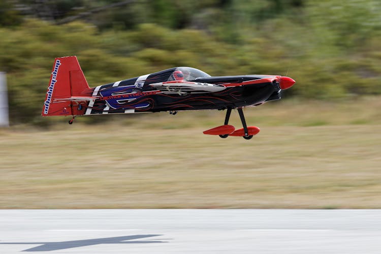 Black And Red Jet Taking Off