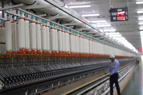 Foto profissional grátis de dentro de casa, empresa, local de produção industrial