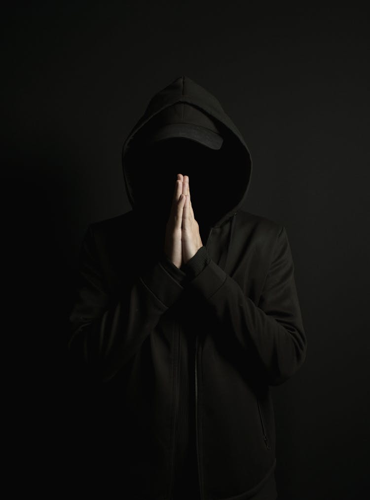 A Man In Black Hoodie