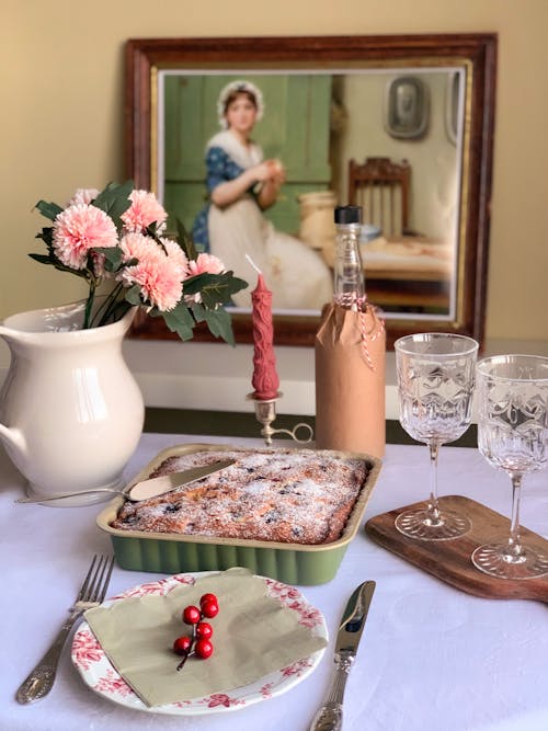 Table served with pie and tableware