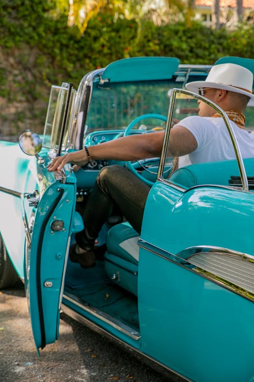 Man Posing In Classic Car, Cuba, Havana