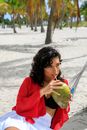Girl in Red Shirt Holding Coconut Fruit