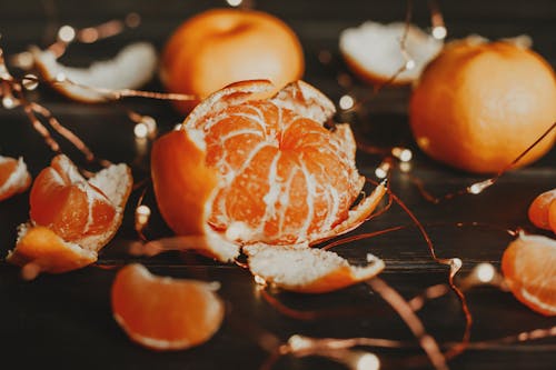 A Peeled Orange Fruit on the Table